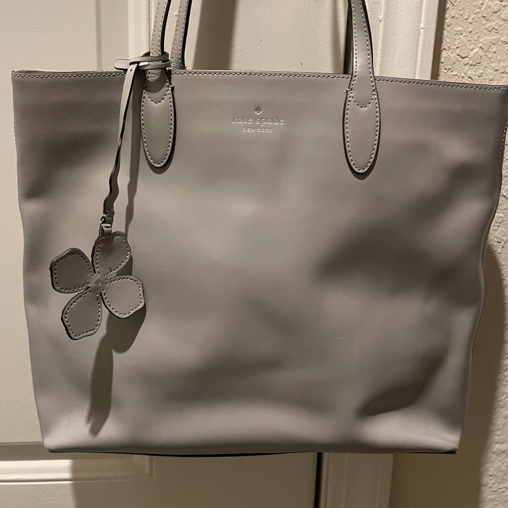 kate spade gray leather tote with floral charm